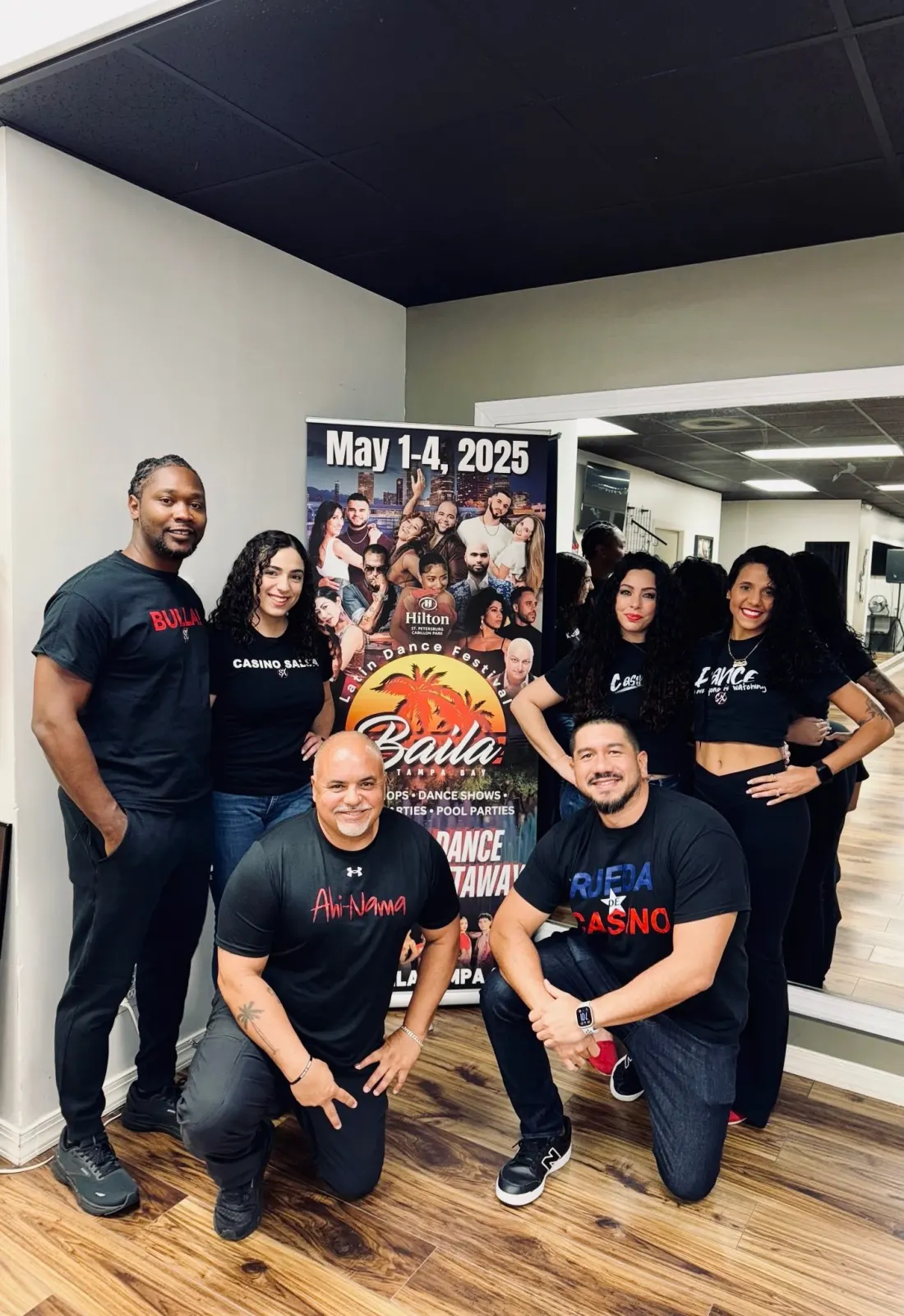 Casino Salsa dancers gathered together at the studio